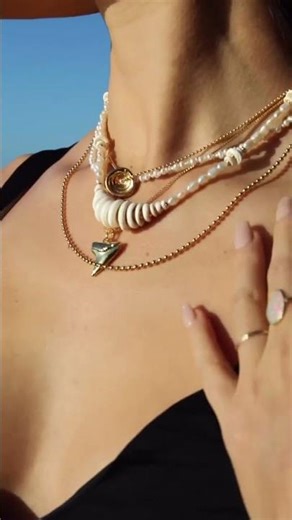 The ultimate duo: Raw puka shells and shimmering gold
