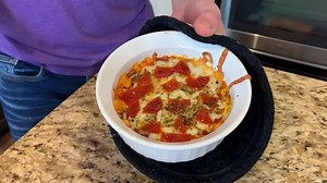 Keto Pizza Dip is so easy to make! Grab a few basic ingredients, mix them together and find your favorite "chip" to dip! Bring it to your next party, or make them for movie night at home! We used two 12oz Ramekins in our recipe https://www.simplefunketo.com/blog/ketopizzadip | The Keto Dad