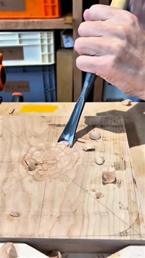 The Process of Carving Wood Using a Chisel to Make Holes