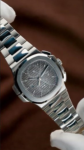Patek Philippe Nautilus Travel Time Steel Mens Watch 5990A 5990 | SwissWatchExpo