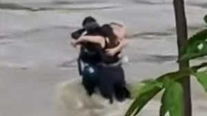 Three friends seen in 'final embrace'