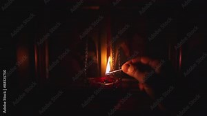 lamp in a dark room lit the lamp, then stewed, dark room, light a candle