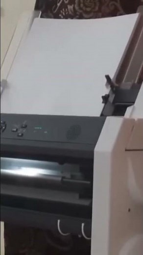 Braille embosser machine used to Print out in Braille for visually impaired using JAWS software.