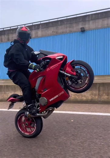 Mastering Wheelies on a Ducati in the Rain