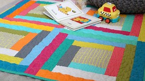 Modern log cabin baby quilt tutorial
