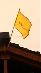 Yellow flag on the roof of Indian Temple swastika is used as a symbol of divinity spirituality in Indian religions, including Hinduism Buddhism and Jainism Sun Symbol swastika symbolises lightning