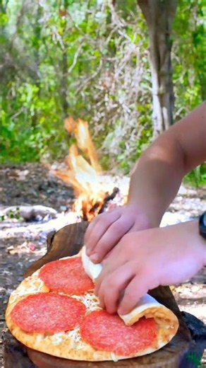 Try This Genius Campfire Pizza Hack #pizza #camping #outdoorfood