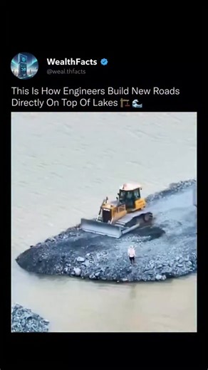 WealthFacts on Instagram: "Road Building Mastery Engineering on Water ​Discover the incredible process of building a road directly through a body of water in this viral-worthy engineering showcase. This Reel captures the precision of "end dumping" and displacement methods, where heavy machinery like excavators and bulldozers strategically place rock and dirt fill to create a stable "floating" platform over soft, wet terrain. By pushing material forward and allowing it to settle, engineers can co