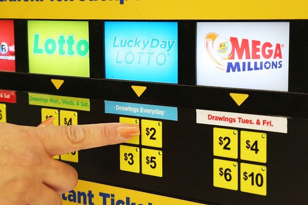 ‘We were in total disbelief’: Coworkers to split winnings after hitting $350,000 Lucky Day Lotto jackpot