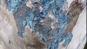 Cracked cement and sand wall and scratched paint for background or decoration.