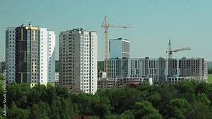 Development Of Modern Multi-storey Residential Houses time lapse, timelapse, time-lapse. Works in construction site area. Development Multistorey Residential Building in summer day. development on
