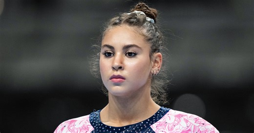 Levi Jung-Ruivivar, a former U.S. gymnast, says she suffers anaphylactic reaction in the Olympic Village