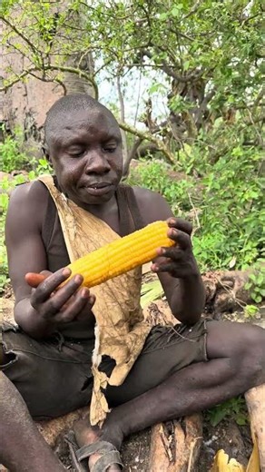 Hadzabe Tribe bushmen Chabba try corn for the first time in the bush 🥰