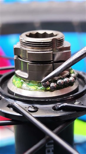 How to apply grease and install bearing balls in a bicycle freehub.
