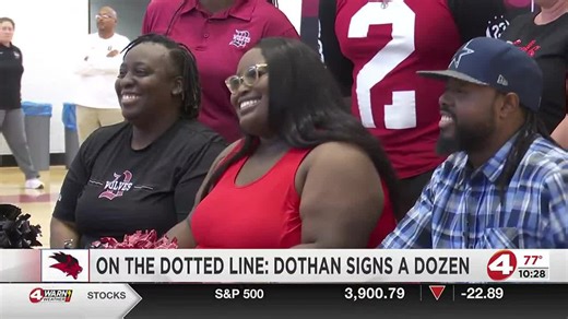 On the dotted line: Dothan signs a dozen