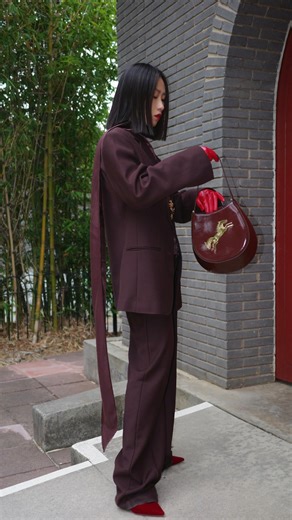 Ai Liu on Instagram: "Celebrating Chinese New Year with @hm 🐎 The @jacqueswei.studio x @hm collaboration captures strength, movement, and modern elegance through sculpted silhouettes and refined details. A bold new year begins here. #ad @hm #jacquesweixhm #hm"