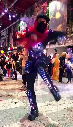 Futuristic LED Dance Performance in Urban Setting