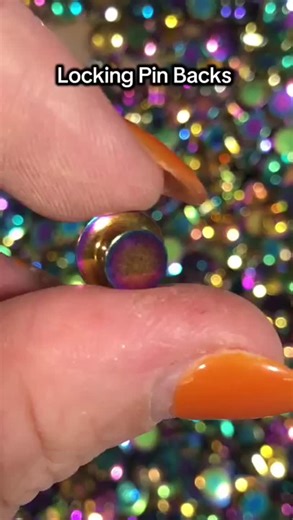 The Enamel Pin Factory on Instagram: "🔒✨ What is a Locking Pin Back? ✨🔒 Worried about losing your favourite pin? A locking pin back adds that extra layer of security your badges deserve. 👉 Unlike rubber or butterfly clutches that can slip off, locking pin backs: ✔️ Push on & hold your pin securely in place ✔️ Only release when the small flange is squeezed ✔️ Keep your pins safe, wherever you wear them! ✨ Perfect for collectors, merch lovers, or anyone who doesn’t want to risk losing their pin