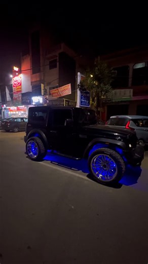 Detailing Bot on Instagram: "22-inch alloys with app-controlled RGB tyre lights.🛞⚡️ #TharLife #CustomThar #AlloyWheels #CarModification #RGBLights"