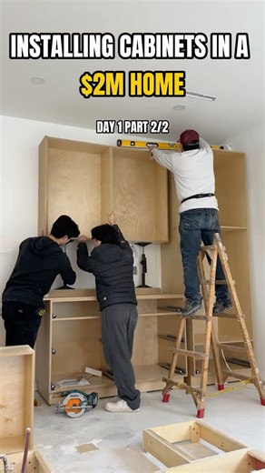 Hanging upper cabinets in a custom kitchen