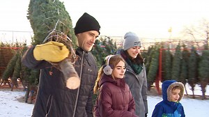 Christmas tree sale gives young football players a way to give back