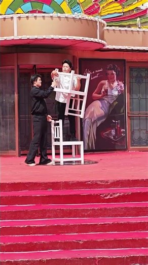 This young man can do a handstand on a chair and stay perfectly still? His balancing skills are t...