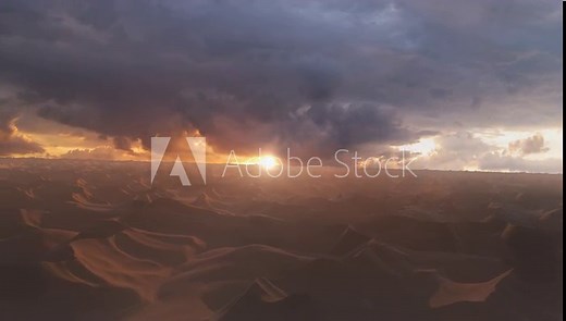 Desert dunes mountains at sunset with lightning clouds, aerial Cinematic view of desert dunes with sunset flares, 4K, 2024