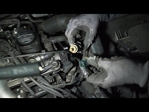 Wo befindet sich der Temperatursensor für das Kühlmittel im Audi A3 und wie kann er ersetzt werden?