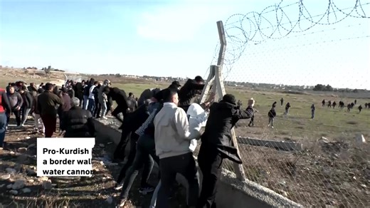 Pro-Kurdish protesters climbed the border wall from Turkey to Syria as security forces deployed water cannons and tear gas to disperse crowds opposed to Syrian advances into Kurdish-held areas https://reut.rs/3Zocbuw | Reuters
