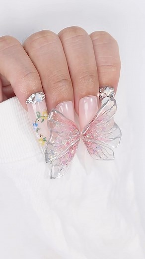 We’re here for the three dimensional nails! 🦋💅 Colors Used: You’re Such a Teas 196 777 - 88 Vibe Check French White Nail Gems Red Glitter Gel Liner Overlay Top Coat #PLANails 🖤 #PLApro #parislashacademy #3dnails #threedimensionalnails | PLA Nails