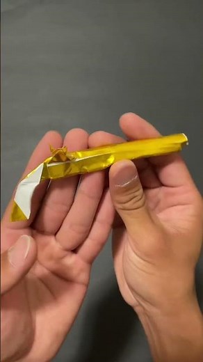Origami gold flintlock pistol showcase