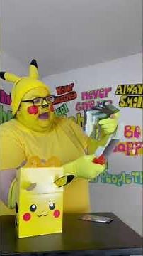 Pikachu opens McDonald’s happy meal Pokémon cards!