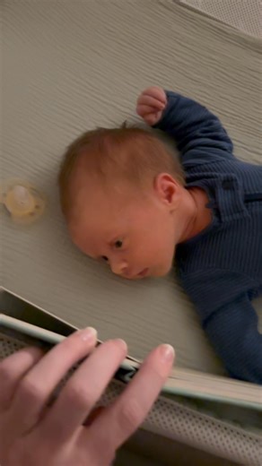 Showing Asa his first colors book! Trying to make the most of our wake windows | Emily Spellman