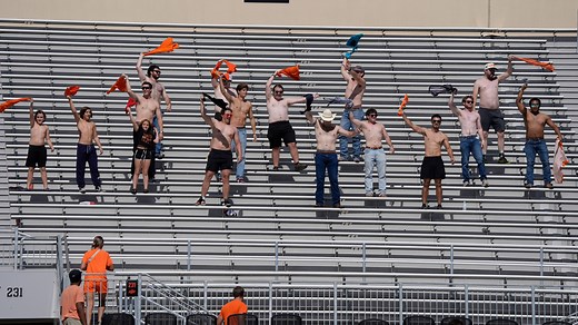 Watch as Oklahoma State fans create viral 'shirtless section' at OSU-Houston game