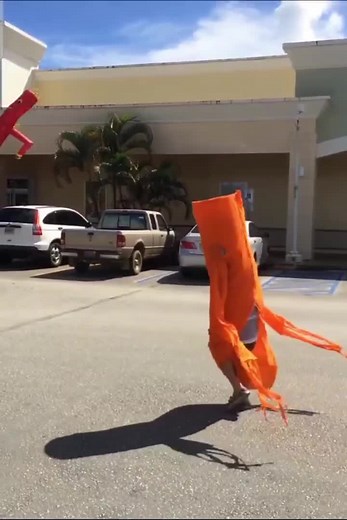 Inflatable Tube Man Dance Off: Big vs Little Challenge