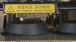 3D Printer using black plastic - Free Stock Video