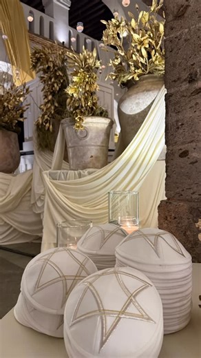Kippot World on Instagram: "RACHELLE & MICHAEL The Berberisca ceremony takes place before the Jewish religious wedding. It is an ancient tradition of the Jews of North Africa, particularly Morocco, in which the bride is dressed in a velvet gown embroidered with gold threads and richly adorned with symbols representing the Sefer Torah. The ceremony symbolizes the bride’s preparation to go to her in-laws’ home, where she will live a few days later, following the religious wedding. As she is dresse
