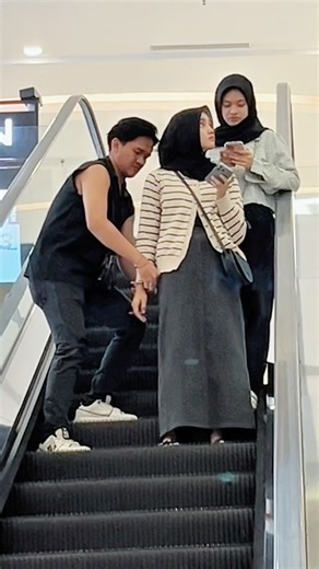 Handcuff prank escalator #prank #viral #funny