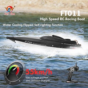 Pre-order Arriving 14th of December RC Boat FT011 2.4Ghz Available in Black. Keeping Up with Our Tradition with Upgrades. Comes With Extra Battery Included In The Price Retail Price $299 our Price $260 With Speed Up to 55km/Hr And AutoCorrect Flips Back Over, It Even a Great Christmas Gift for a Parent : Specifications: 55km/h high speed with the brushless motor, Water cooling system Self-righting function - no worry about capsizing. It flips upward after being turned upside down waterproof with
