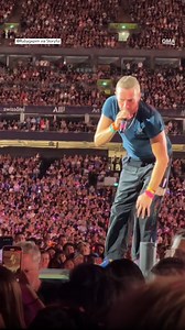 Chris Martin saw a young fan squeezed in the standing section at his Sydney concert and helped him secure a better view. https://gma.abc/3EVoENo | Good Morning America