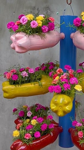 Balcony & Garden on Instagram: "Beautiful 3 Storey Portulaca (Mossrose) Hanging Garden For Balcony 🌸🌺 #flowers #flowerstagram #diy #gardening #diygarden"