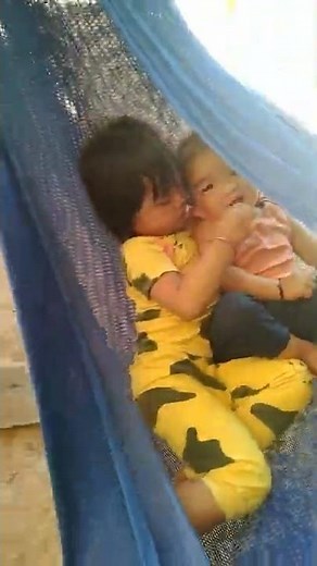 Sister and brother sleep all together