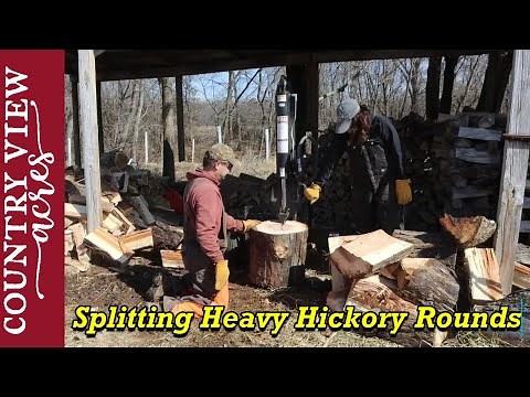 Rebekah Runs Log splitter for first time. We're turning Hickory Logs into some premium firewood.