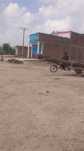 Traditional Motorcycle Towing Log in Rural Setting