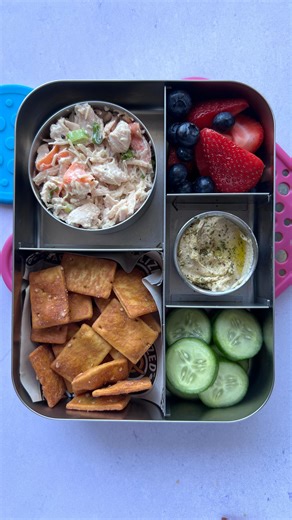 Jenny | Easy Lunch Ideas on Instagram: "My family (and I) always look forward to lunches like this. Snack-style lunches hit a sweet spot that traditional lunches often miss—and that’s why my people love them so much. I’ve been packing lunches like these for years (chicken salad, yummy crackers, hummus, fresh fruit, cucumbers) is basically the gold standard around here 🥒🍇 ⬇️ Here’s why they’re so appealing ⬇️ 1️⃣ Variety without overwhelm 😅 You get a little of everything—protein, crunch, cream