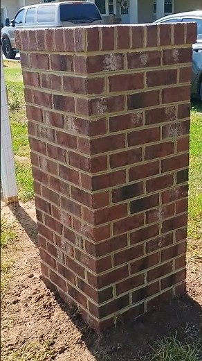 Brick Columns. Working in Pungo, VA to create brick columns for a client's new fence.