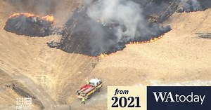 Emergency warning remains in effect as firefighters battle Perth hills bushfire