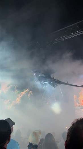 Toothless flying over the audience at The Untrainable Dragon show! #epicuniverse | see.uo