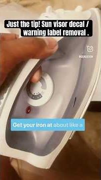 Removing sun visor warning label decal with hot iron and isopropyl alcohol
