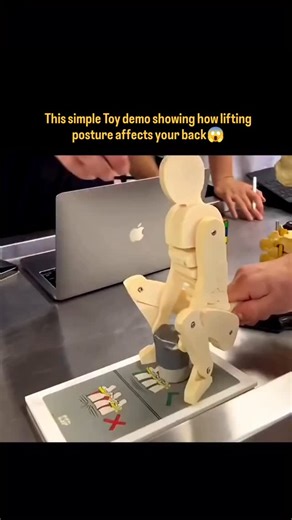 [Explaining Tech] | A simple toy demonstration explains how lifting posture changes the amount of force on the spine. When a load moves away from the body and... | Instagram